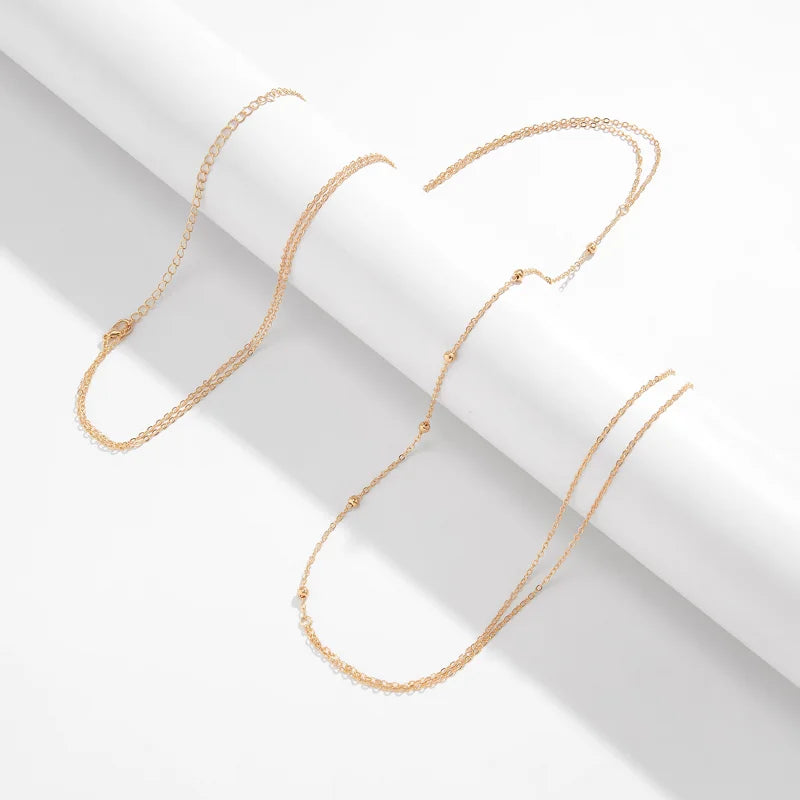 Signature Cross Chest Body Chain